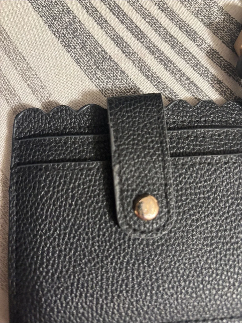 Source Unknown Black Card Holder with Beaded Wristlet and Gold Accent has flaw